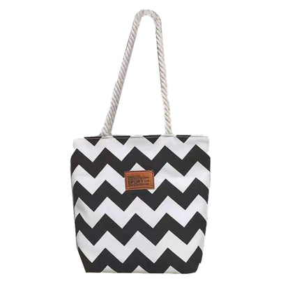 Dollcini Női Kézitáska – Vízálló és Könnyű Műbőr, Fekete-Fehér